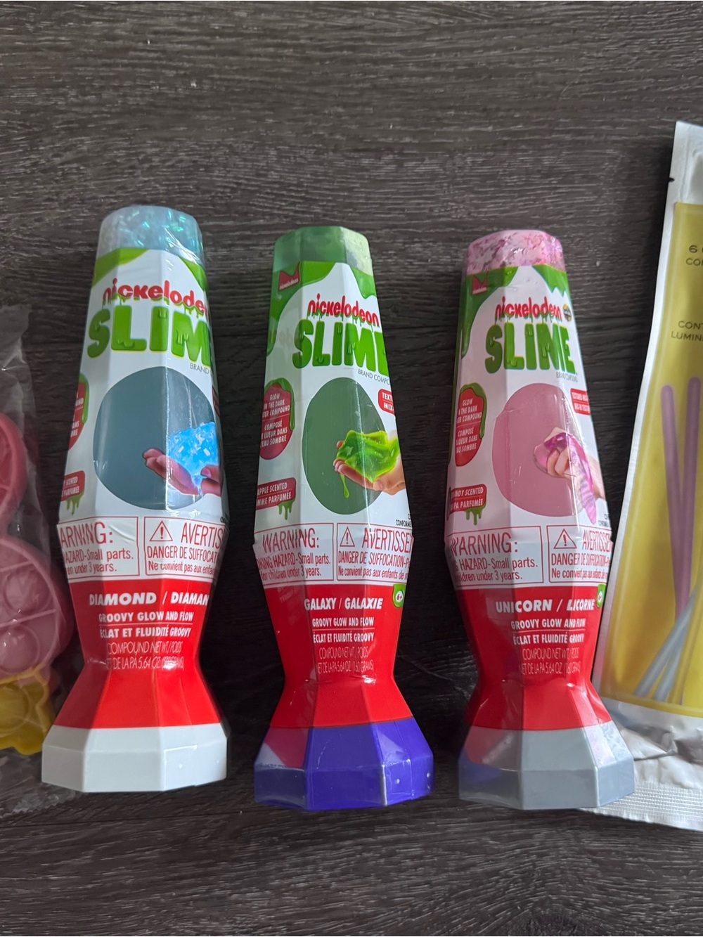 Brand new: Glow in the dark Nickelodeon Slime 3 bottle Set plus bracelets